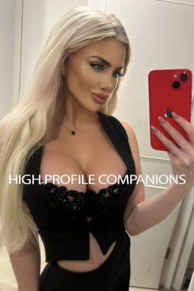 Platinum blonde English girl in a selfie photo
